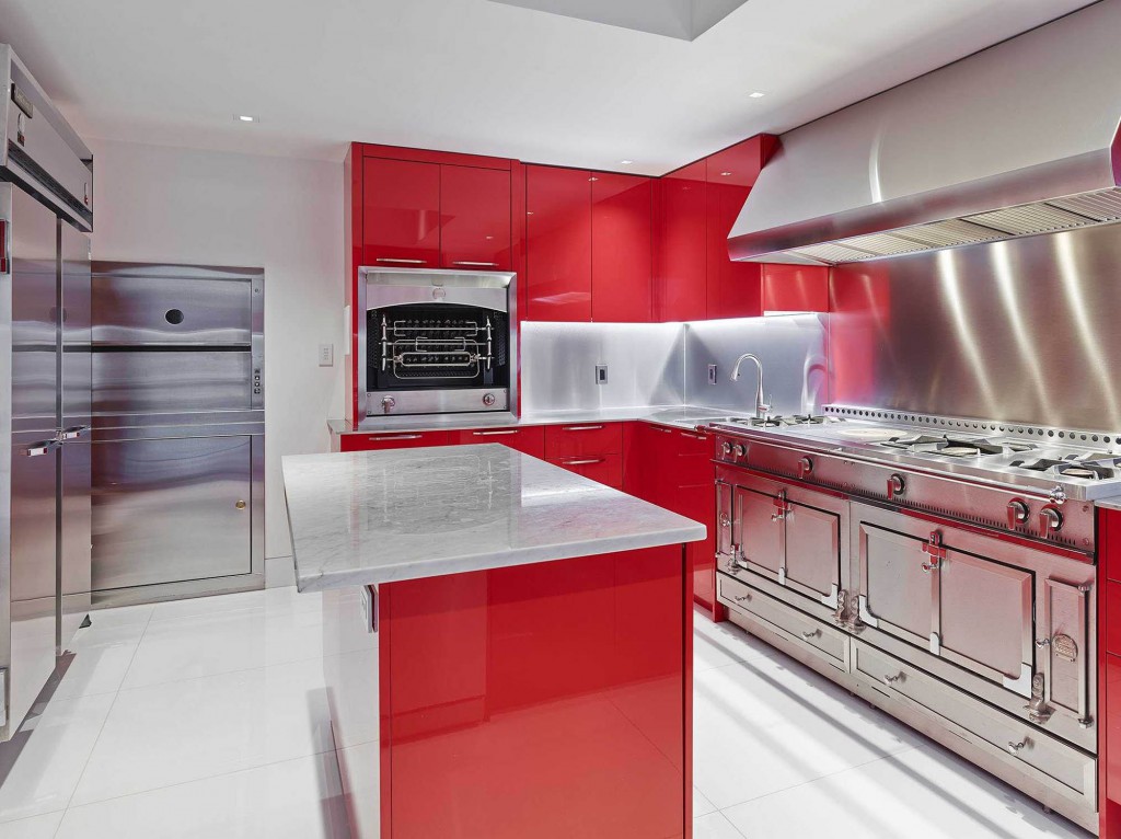 Kitchen with metal and red trim