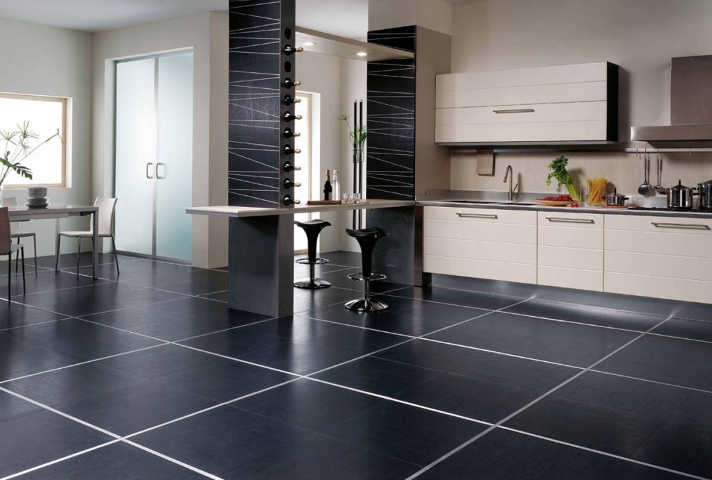 Black tile with white seams in the kitchen