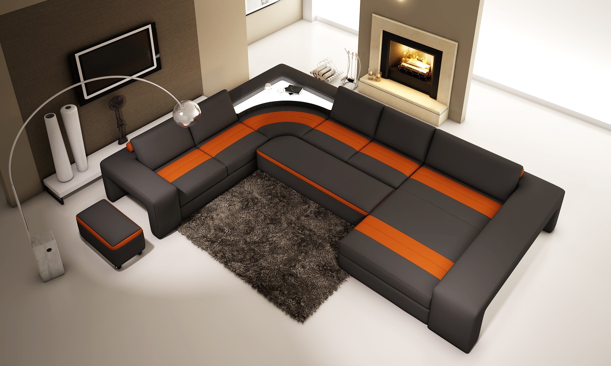 Μαύρος και πορτοκαλί καναπές με οθωμανική στο καθιστικό με τζάκι
