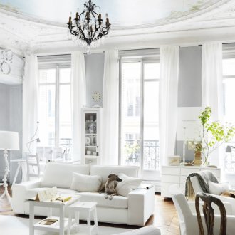 White and gray beautiful living room in the French style