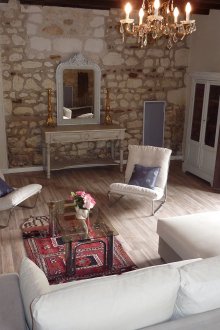 Stone wall decor and white walls in the French style living room