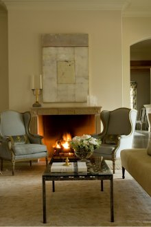 Minimum decor in the living room with a French-style fireplace