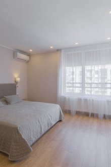 Bedroom with beige accents in the interior