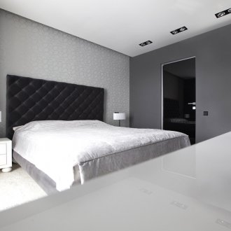Black and white bedroom with a minimum of decor