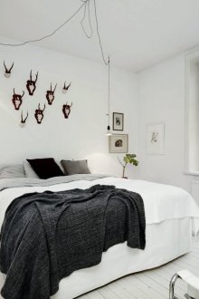 Black and white cozy bedroom in a Scandinavian style