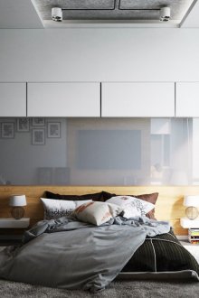 Black and white bedroom with gray glossy panel