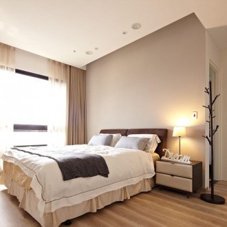Beige walls and floor in the bedroom.