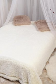 Faux fur bedspread in the bedroom