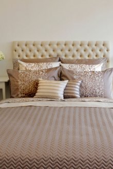 Light brown quilted bedspread in the interior