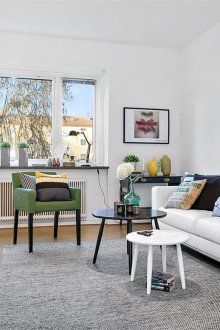 Gray knitted bedspread in a bright living room