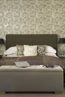 Dark gray bed and glass table in the bedroom