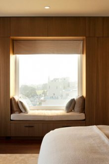 Wooden large wardrobe in the bedroom