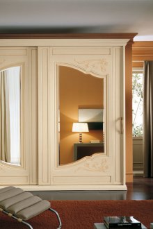 Beige wardrobe with mirrored inserts