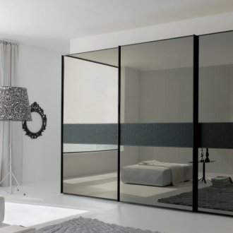 Black wardrobe in a bright interior