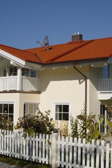 Light facade of the house in the German style