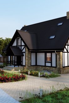 German style two-story house with skylights