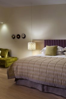 Accenti olivastri all'interno della camera da letto
