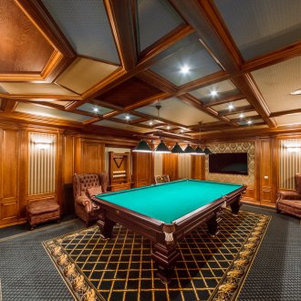 Armchairs in the billiard room in the house