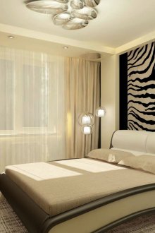 Papel pintado con estampado animal y papel pintado beige en el interior de la habitación