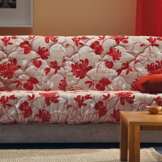 Sofá sin brazos con estampado de flores.