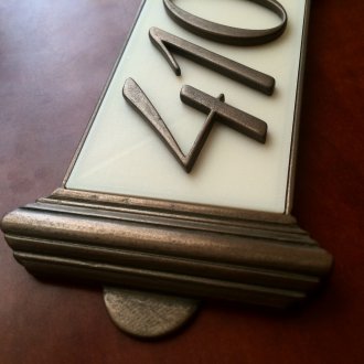 Número de metal de la puerta