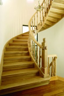 Light wooden staircase in a classic style