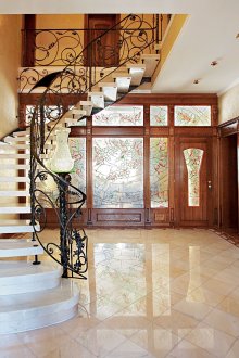 Stone staircase with wrought iron railings