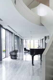 Staircase with solid white railing
