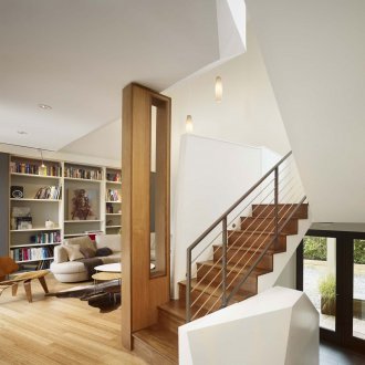 Wooden staircase with metal railing