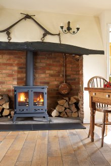 Rustic living room with metal fireplace