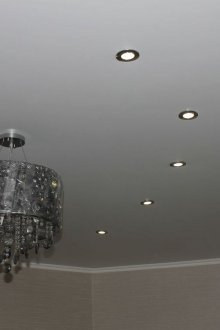 Satin ceiling with spotlights