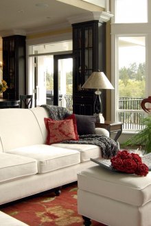Country-style living room combined with kitchen and dining room