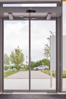 Automatic door with opening mechanism