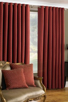 Burgundy curtains on grommets