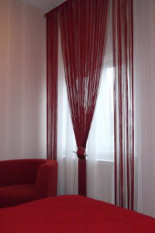Burgundy filament curtains