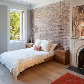 Brick wall in the bedroom