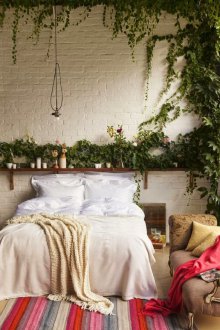 Greenery on the wall in the bedroom