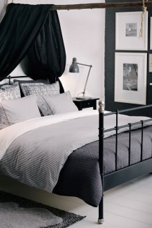 Black wrought iron bed