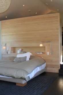 Bed with a niche in the headboard