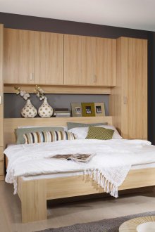 Bright bed with a shelf