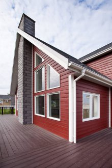 Red fiber cement siding