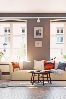 Industrielles Wohnzimmer mit zwei Fenstern