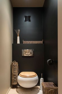 The toilet is round compact
