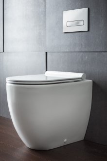 Compact toilet bowl with built-in cistern