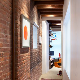 Brick wall hallway loft