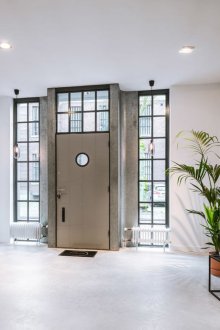 Loft door with expander