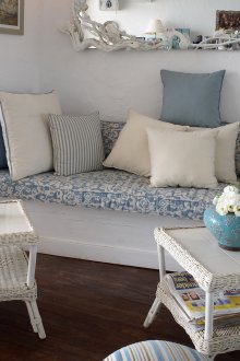 Blue and white living room with provence mirror