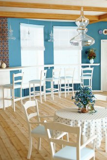 Cafe with bright walls in Provence style