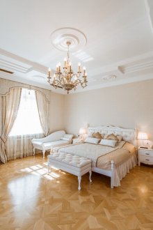 Spacious provence cream bedroom