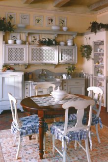 Provence style kitchen with central dining table